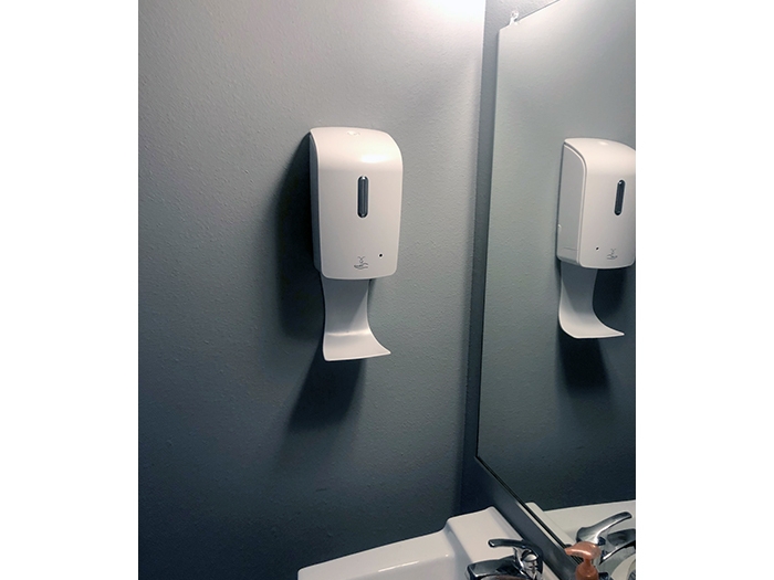 Hand Sanitizer Dispenser Mounted to Bathroom Wall