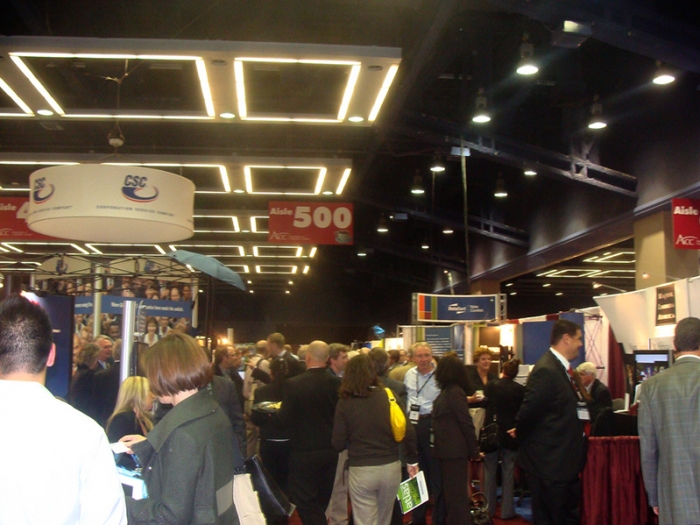 Busy Trade Show Floor with Exhibitors and Participants
